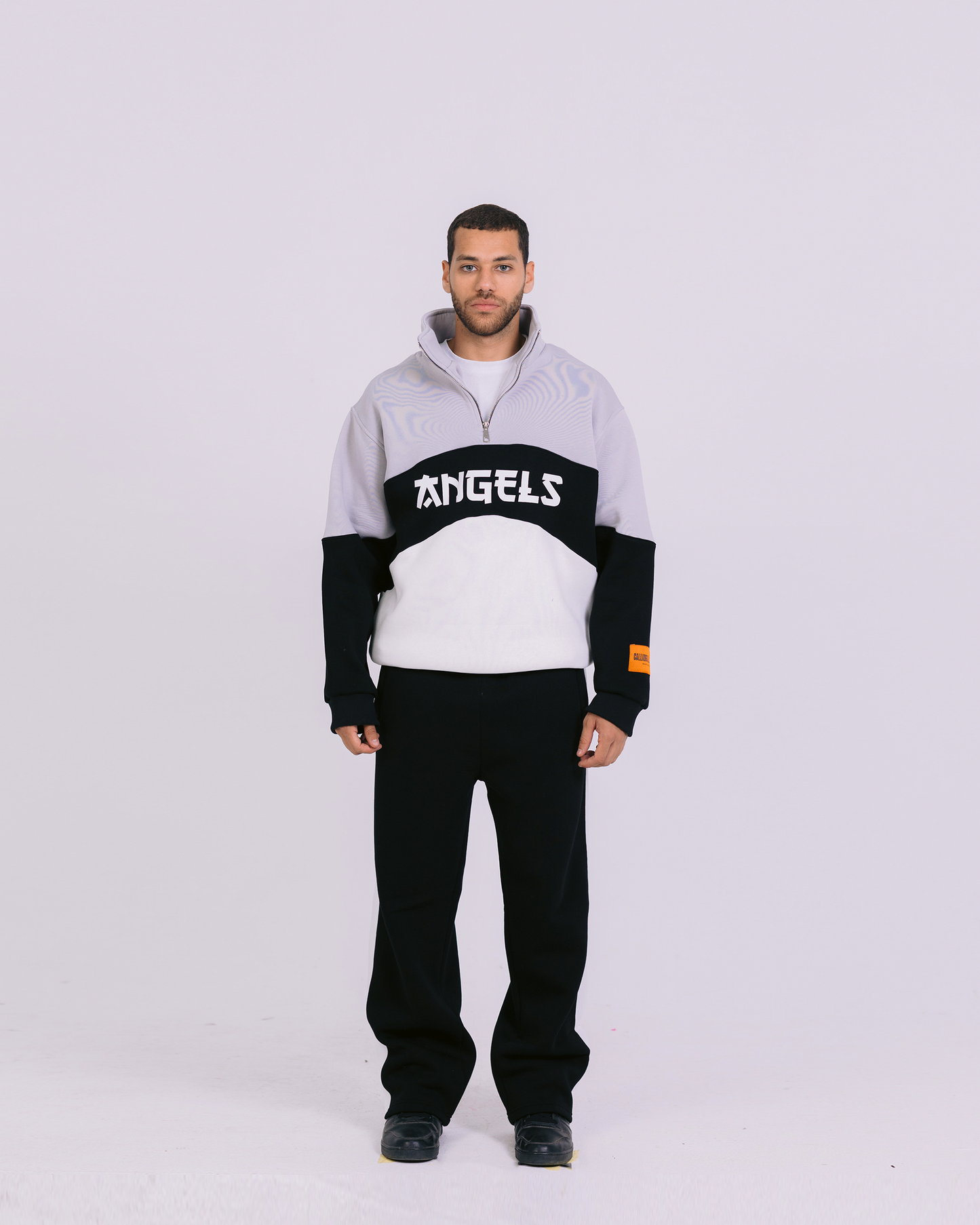 ANGELS QUARTER ZIP SWEATER